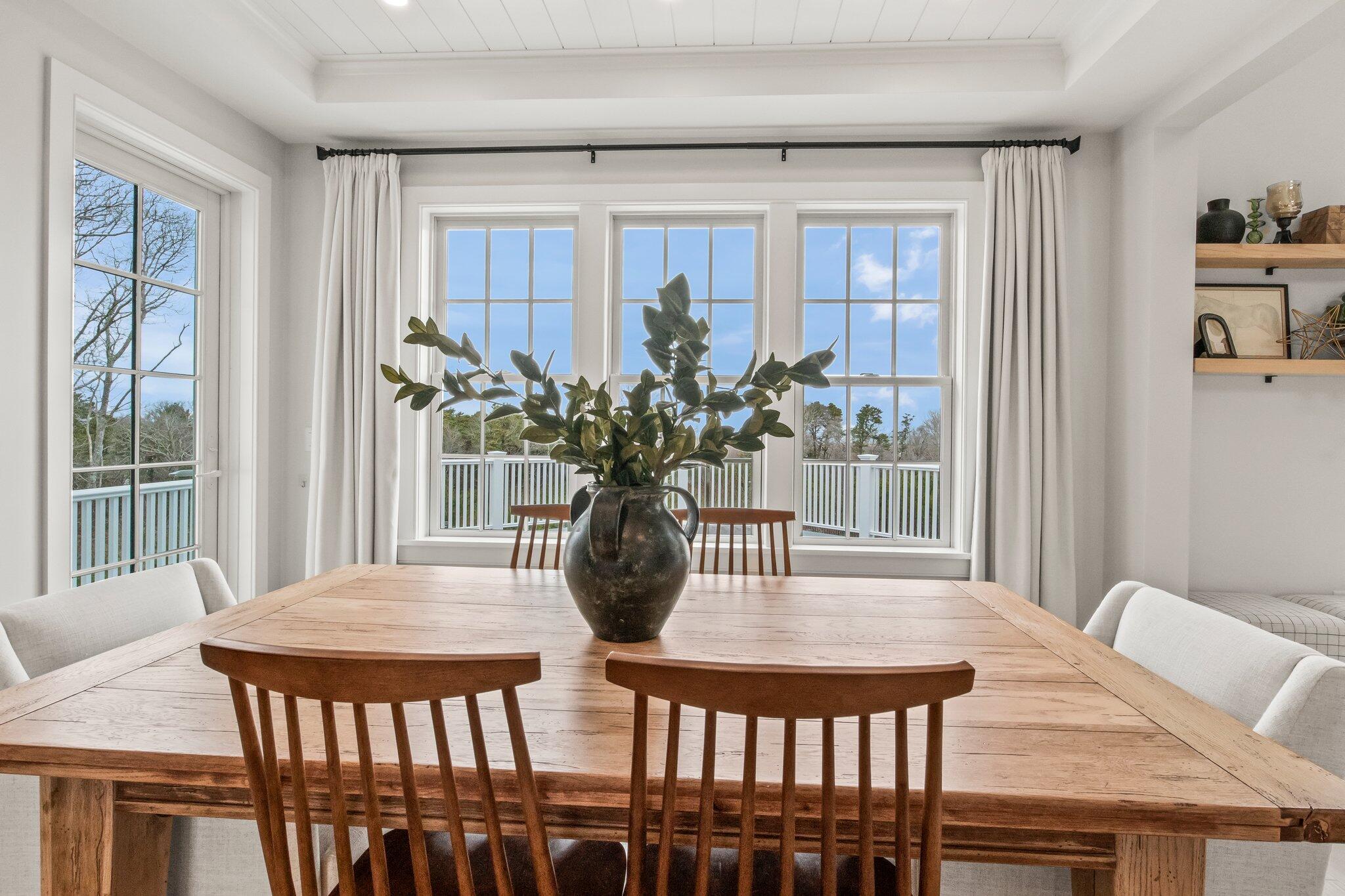 10 Rockhill Road Sandwich, MA 02563 - Photo 11 of 52 a view of a dining room with furniture window and wooden floor