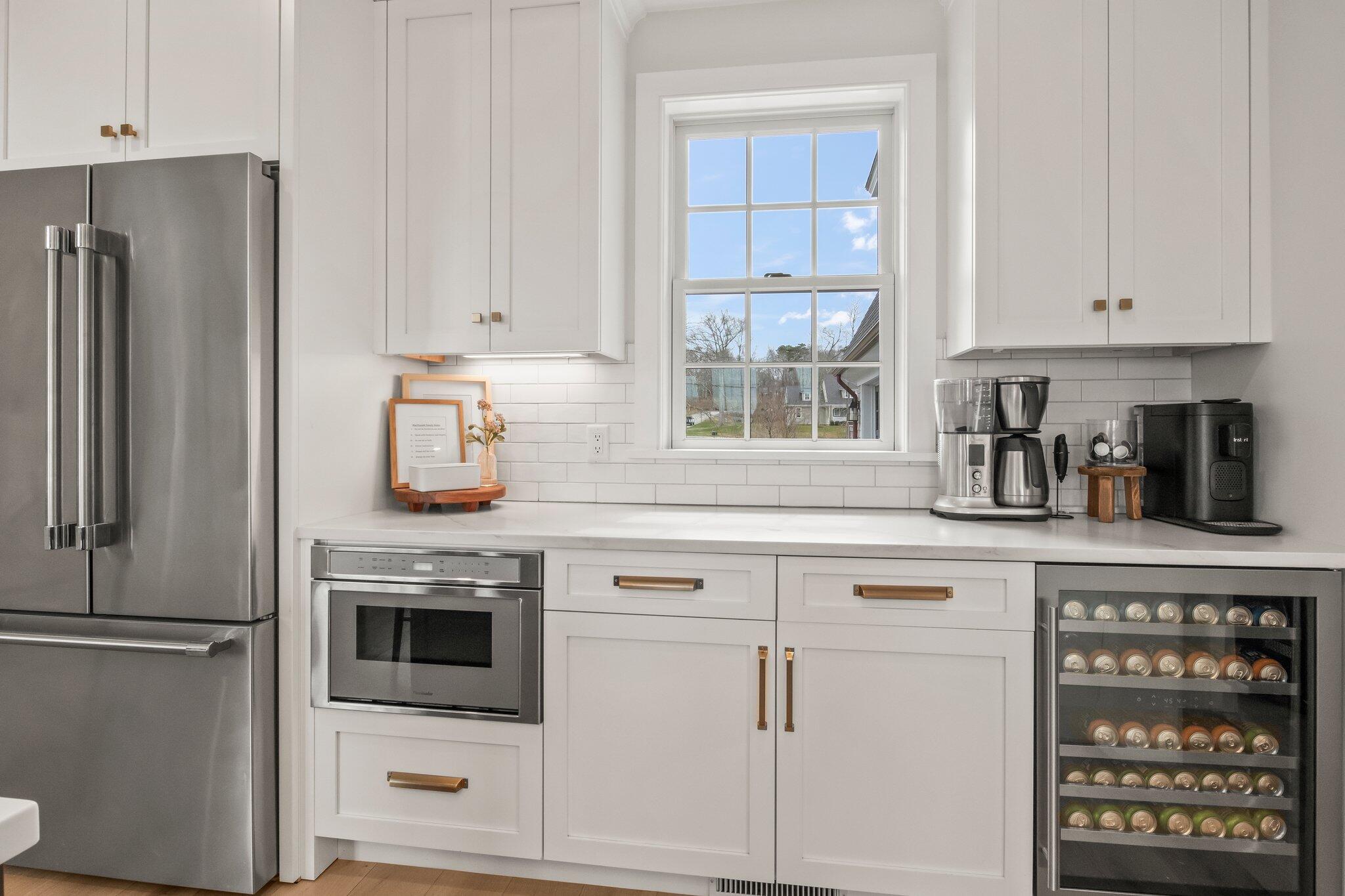 10 Rockhill Road Sandwich, MA 02563 - Photo 15 of 52 a kitchen with stainless steel appliances white cabinets and a window
