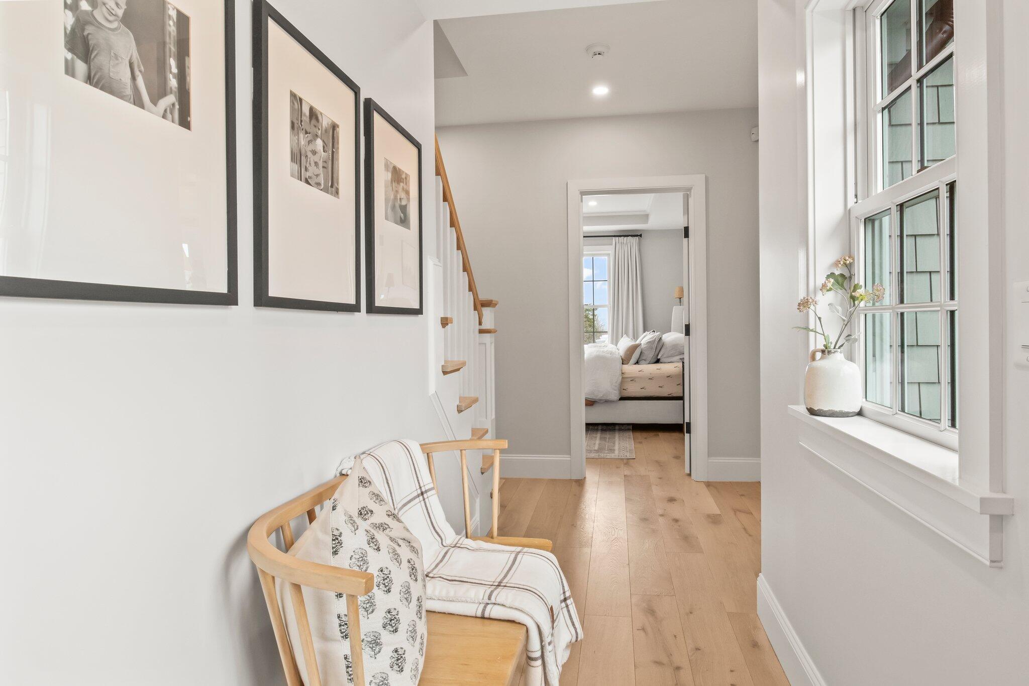 10 Rockhill Road Sandwich, MA 02563 - Photo 16 of 52 a view of a hallway with furniture and a large window