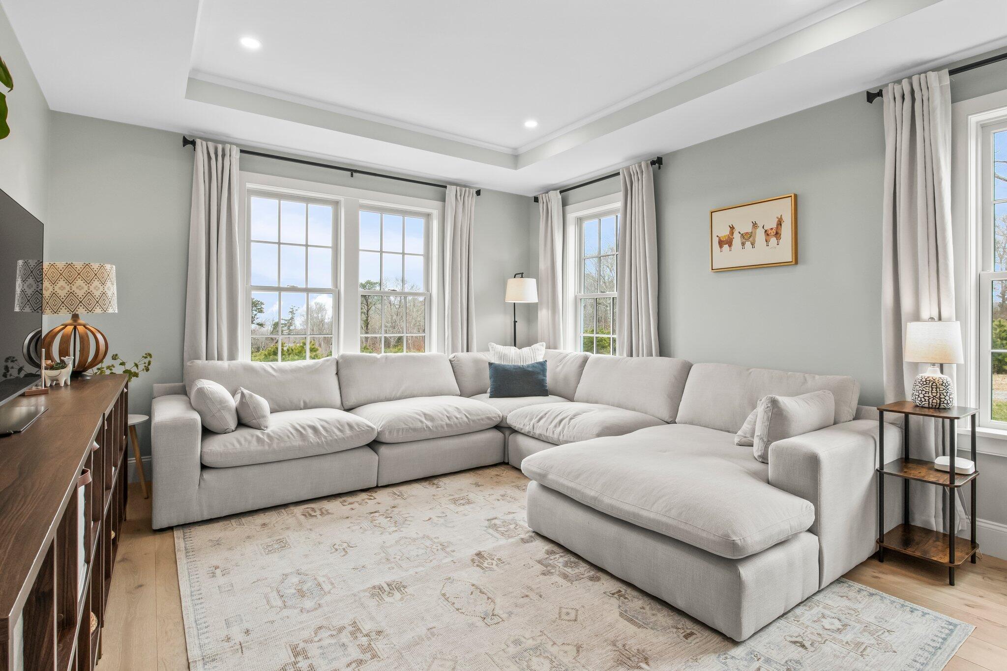 10 Rockhill Road Sandwich, MA 02563 - Photo 17 of 52 a living room with furniture and a large window