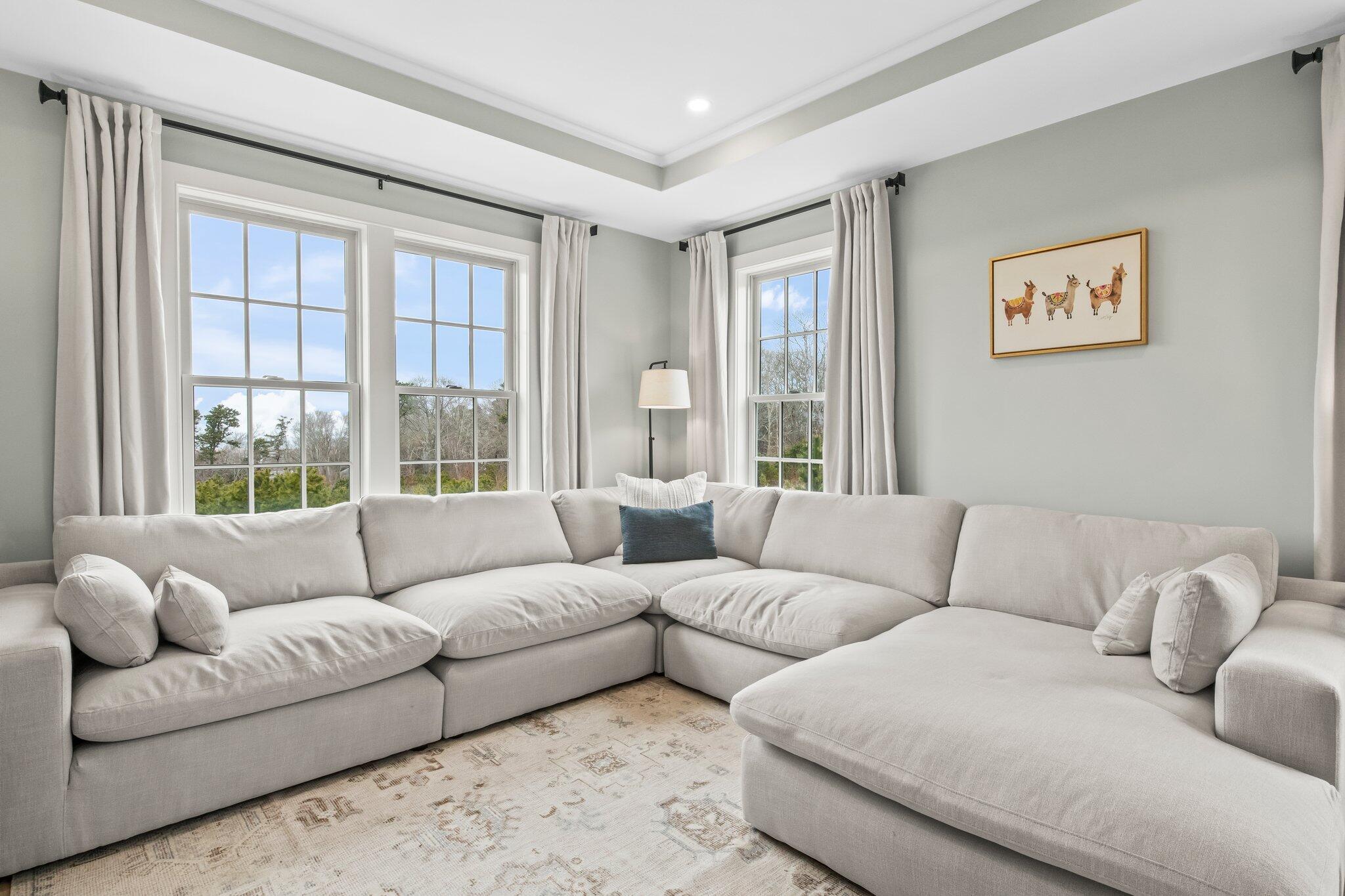 10 Rockhill Road Sandwich, MA 02563 - Photo 19 of 52 a living room with furniture and a large window