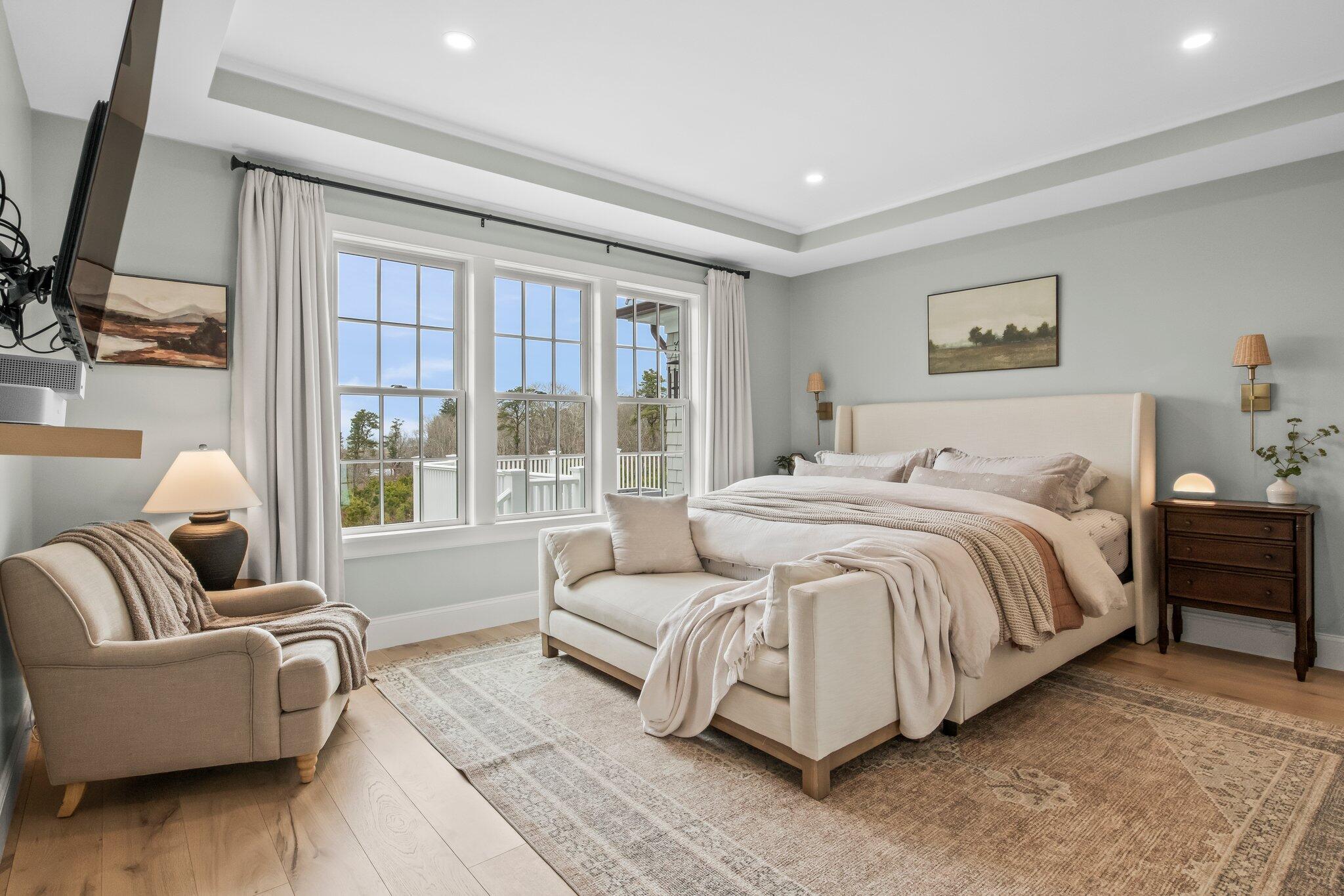 10 Rockhill Road Sandwich, MA 02563 - Photo 21 of 52 a spacious bedroom with a bed couch and a window