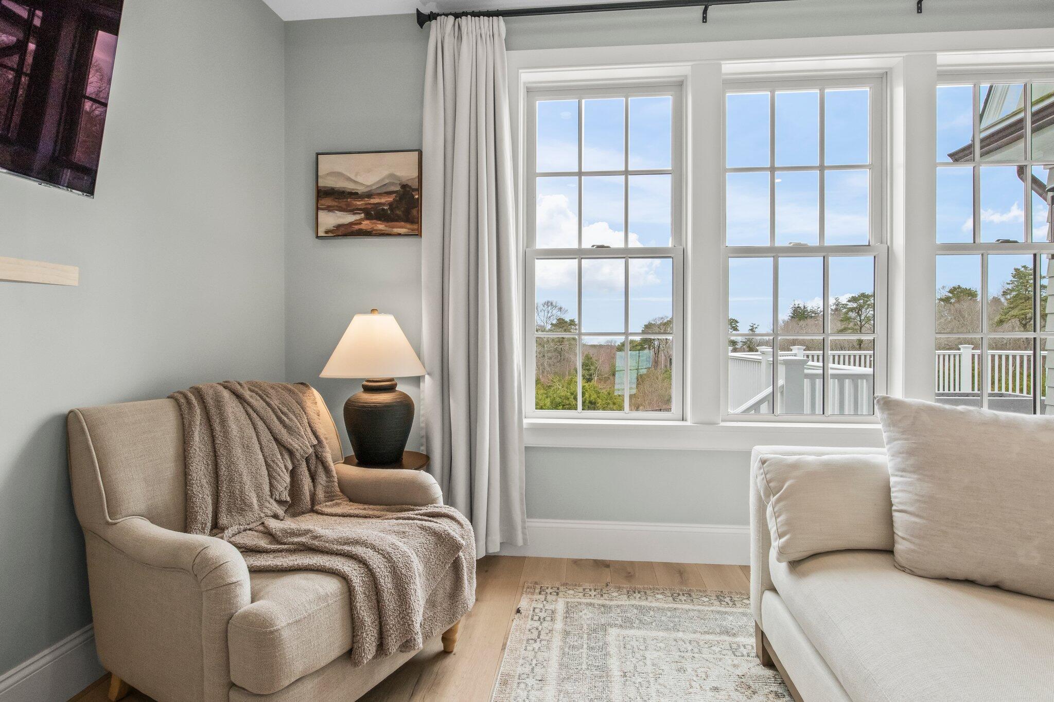 10 Rockhill Road Sandwich, MA 02563 - Photo 23 of 52 a living room with furniture and a window