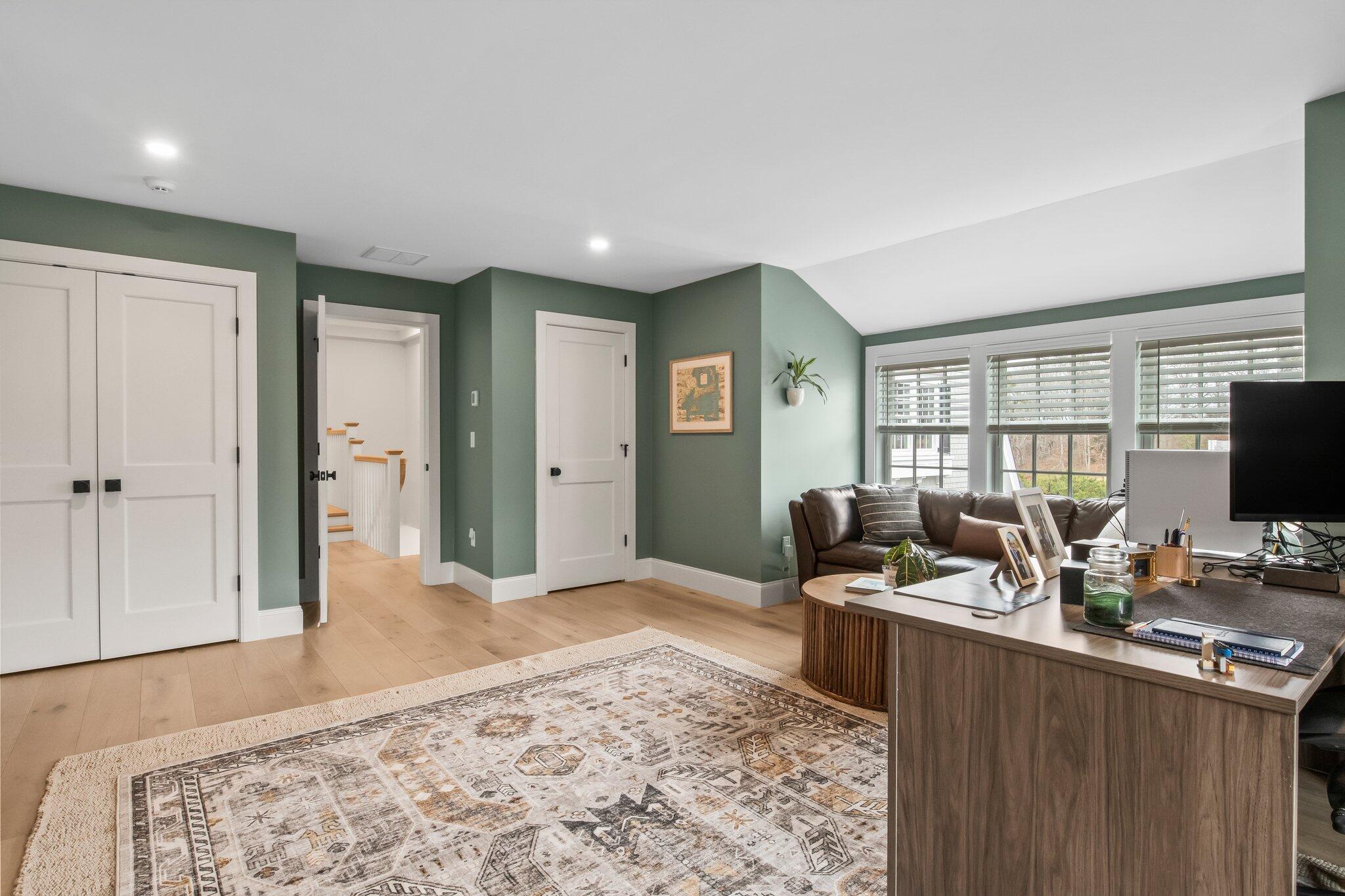 10 Rockhill Road Sandwich, MA 02563 - Photo 27 of 52 a bedroom with furniture and a flat screen tv