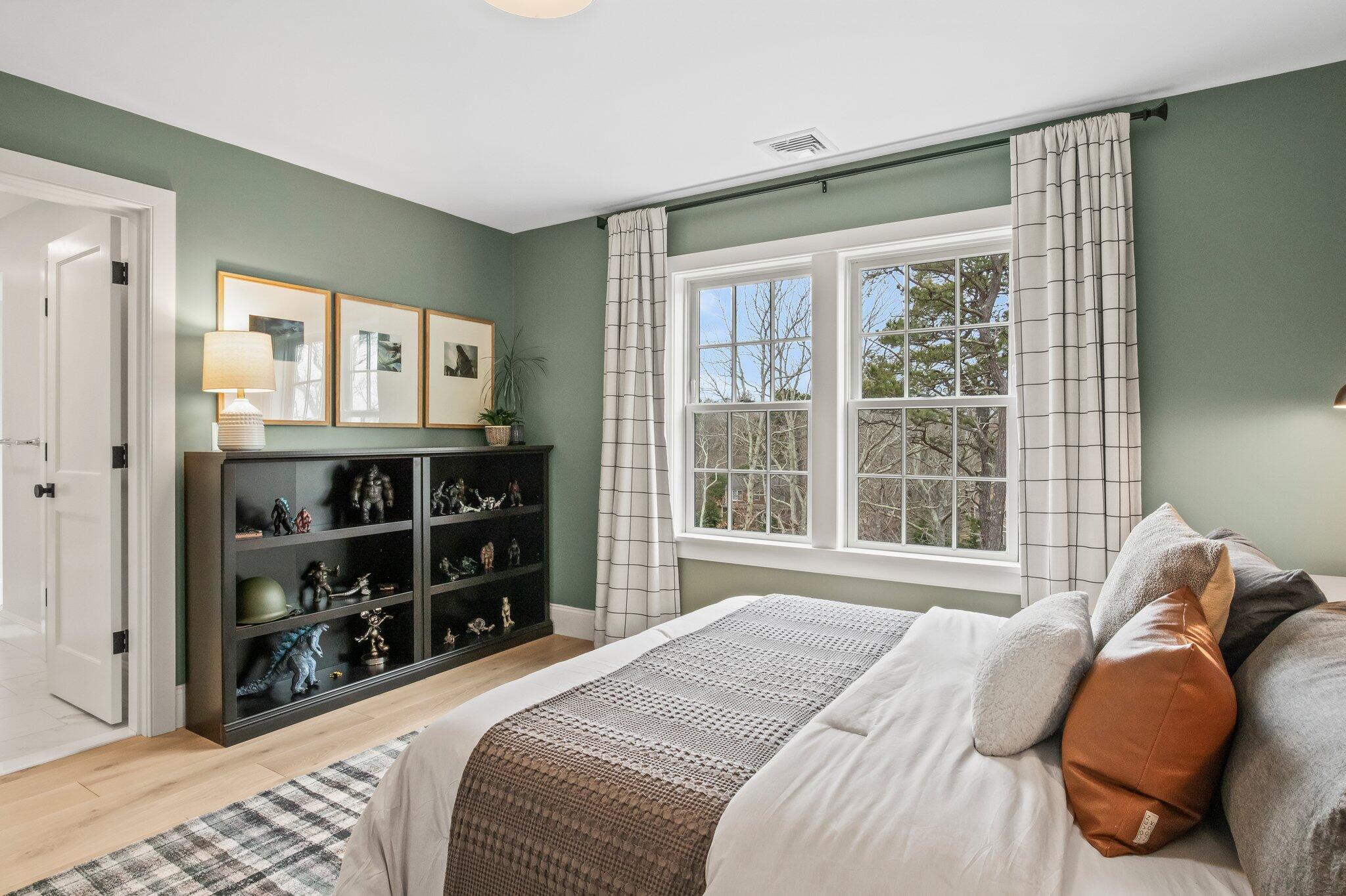 10 Rockhill Road Sandwich, MA 02563 - Photo 30 of 52 a bedroom with a bed a window and walk in closet