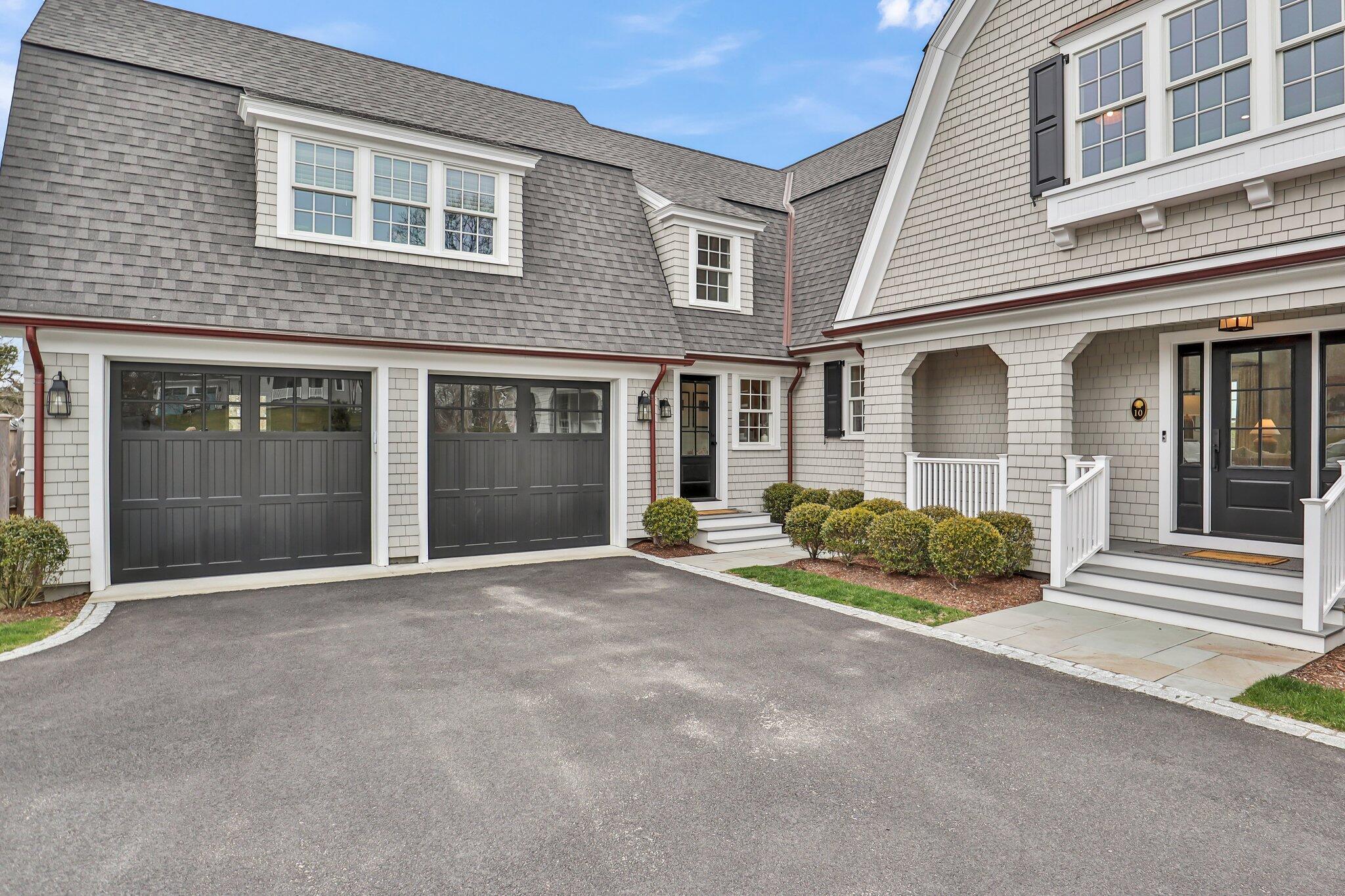 10 Rockhill Road Sandwich, MA 02563 - Photo 3 of 52 a view of a brick house with a large windows