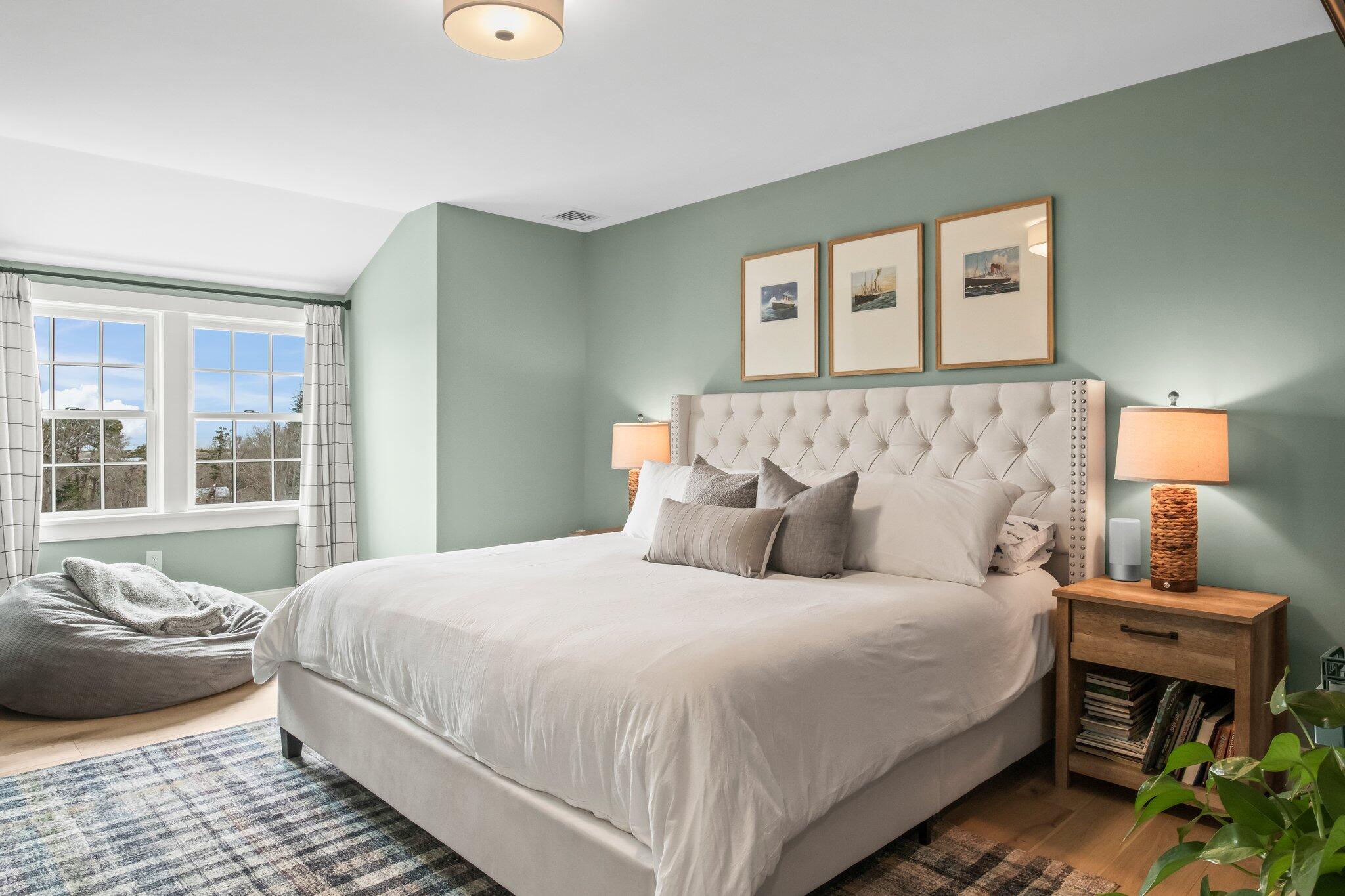 10 Rockhill Road Sandwich, MA 02563 - Photo 31 of 52 a bedroom with a bed and wooden floor