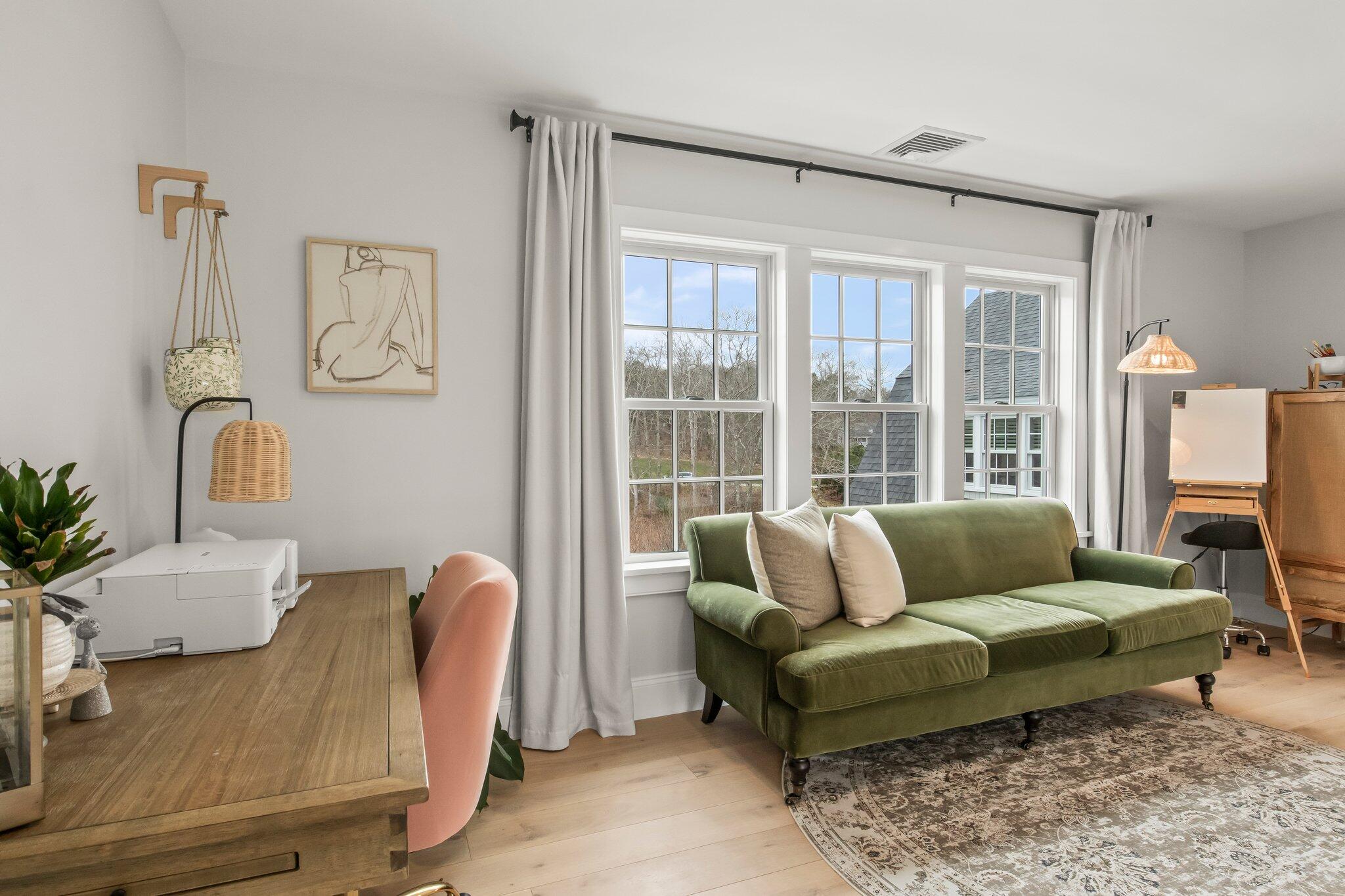 10 Rockhill Road Sandwich, MA 02563 - Photo 35 of 52 a living room with furniture and a large window
