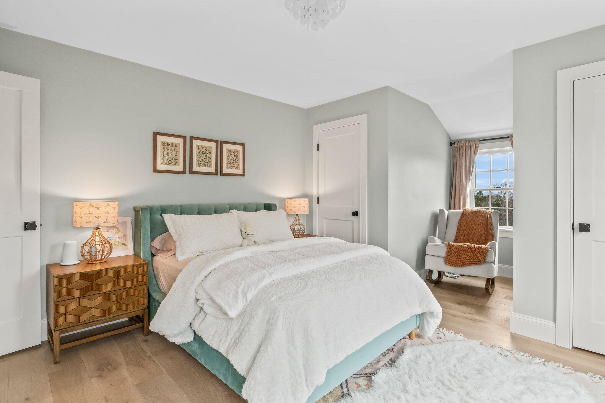 10 Rockhill Road Sandwich, MA 02563 - Photo 36 of 52 a bedroom with a bed and chair