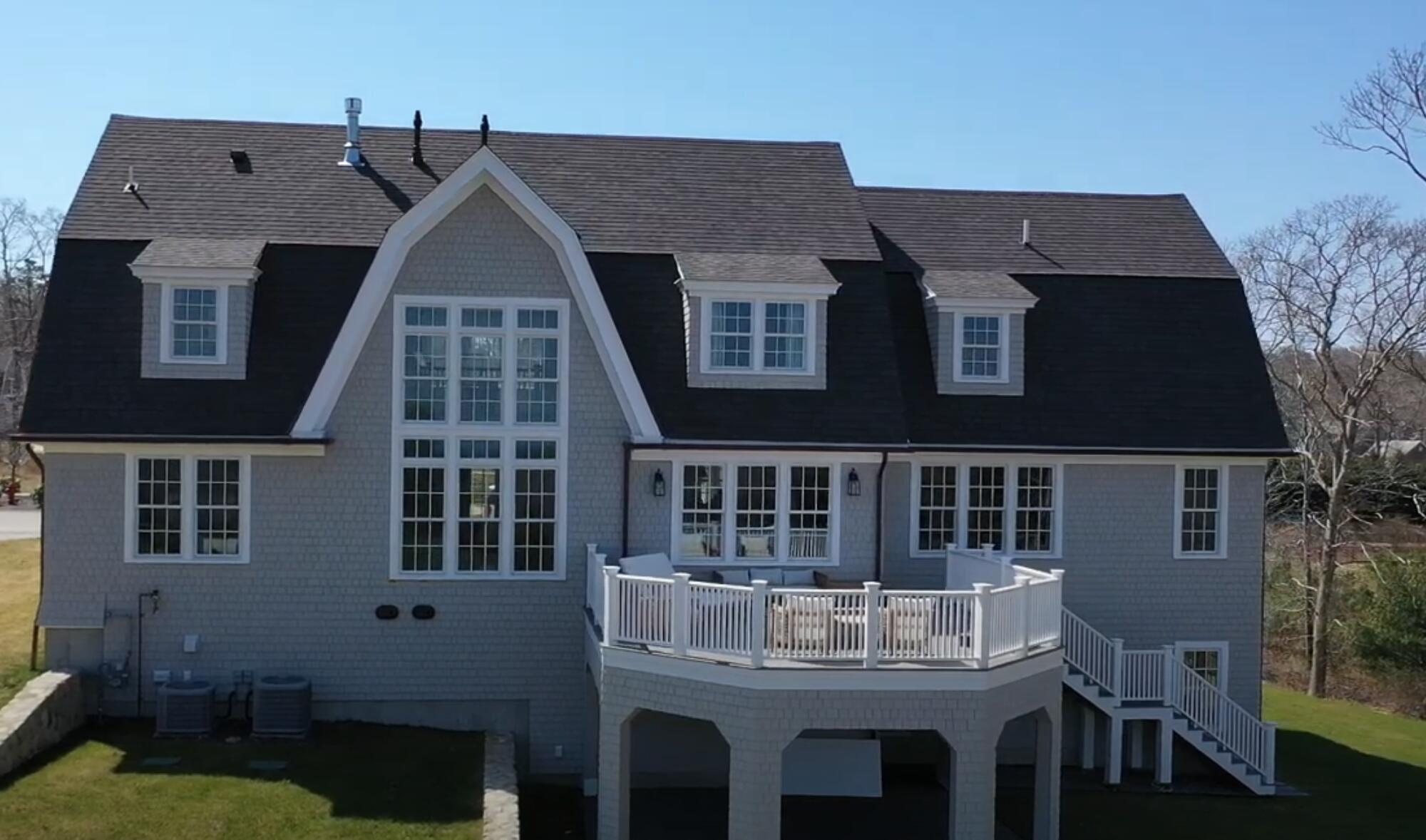 10 Rockhill Road Sandwich, MA 02563 - Photo 39 of 52 a front view of a house with a yard