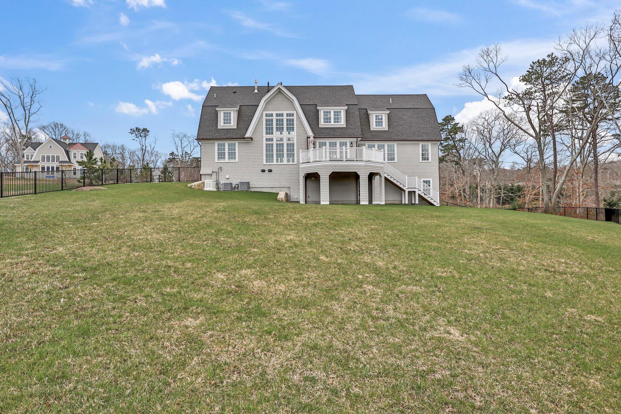 10 Rockhill Road Sandwich, MA 02563 - Photo 46 of 52 a front view of a house with a yard