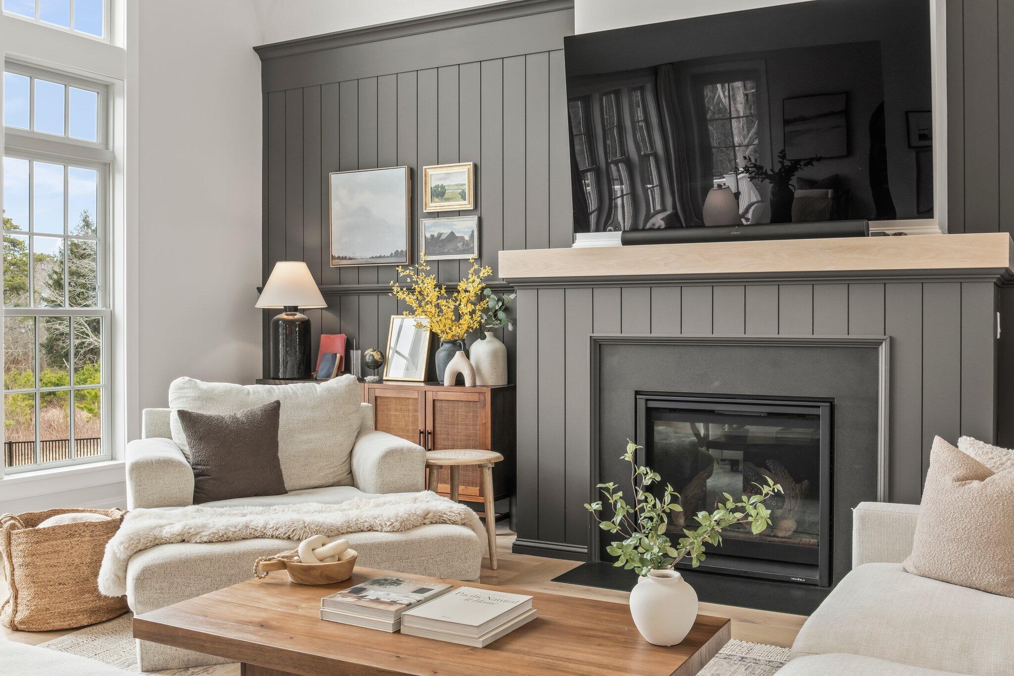 10 Rockhill Road Sandwich, MA 02563 - Photo 8 of 52 a living room with furniture and a fireplace