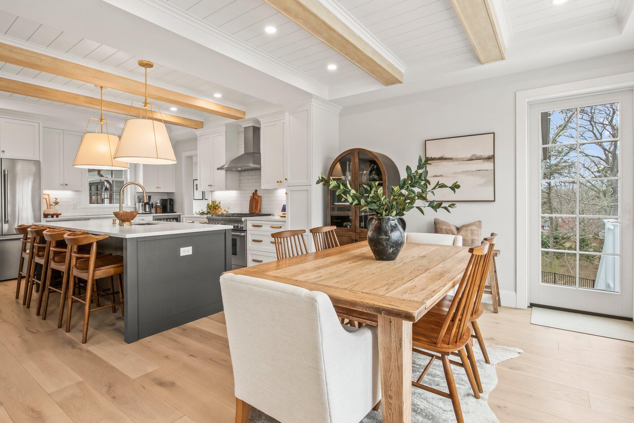 10 Rockhill Road Sandwich, MA 02563 - Photo 9 of 52 a kitchen with a table and chairs in it