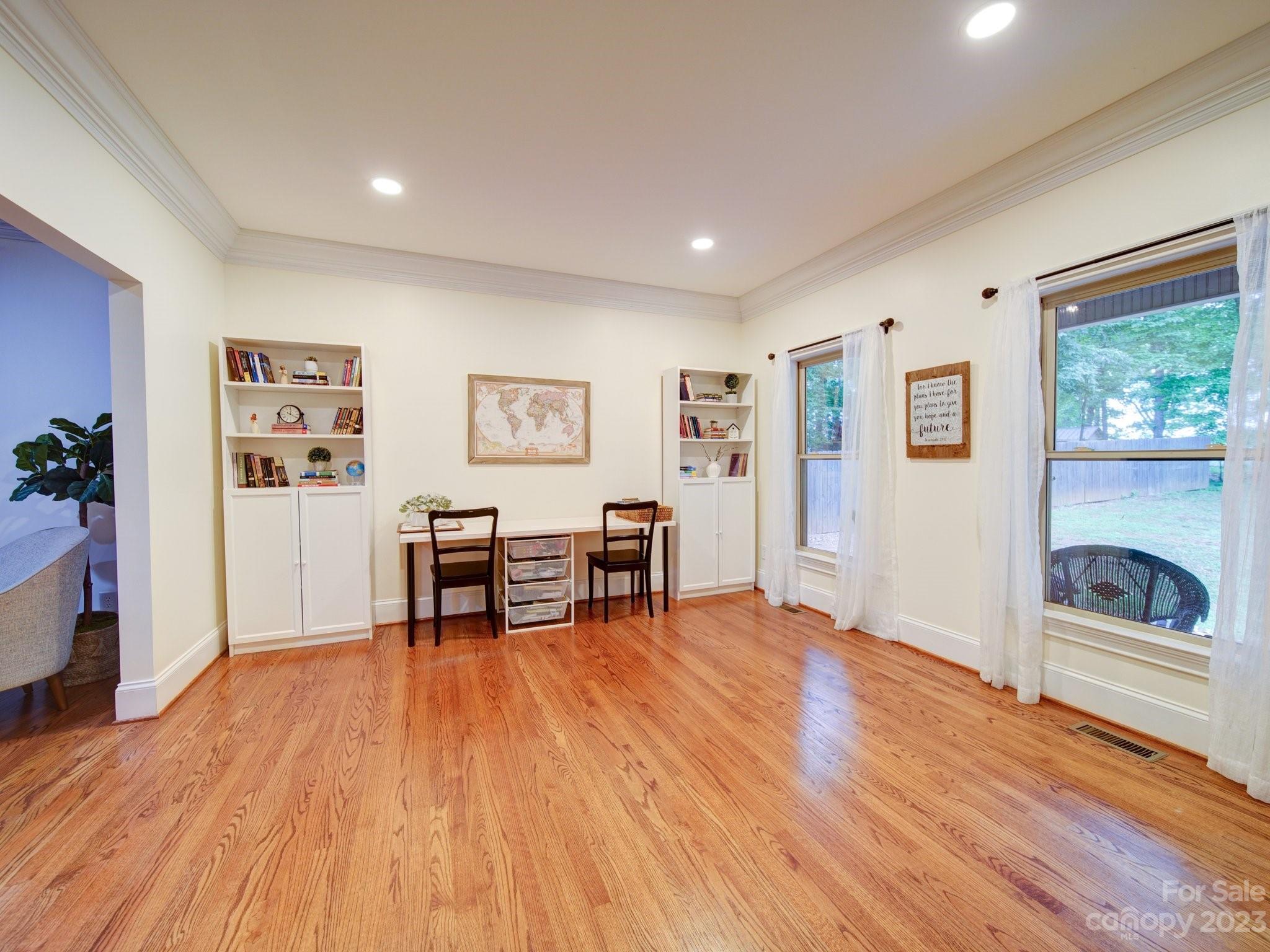 622 West Sandy Ridge Road Monroe, NC 28112 - Photo 10 of 45 a living room with furniture and a wooden floor