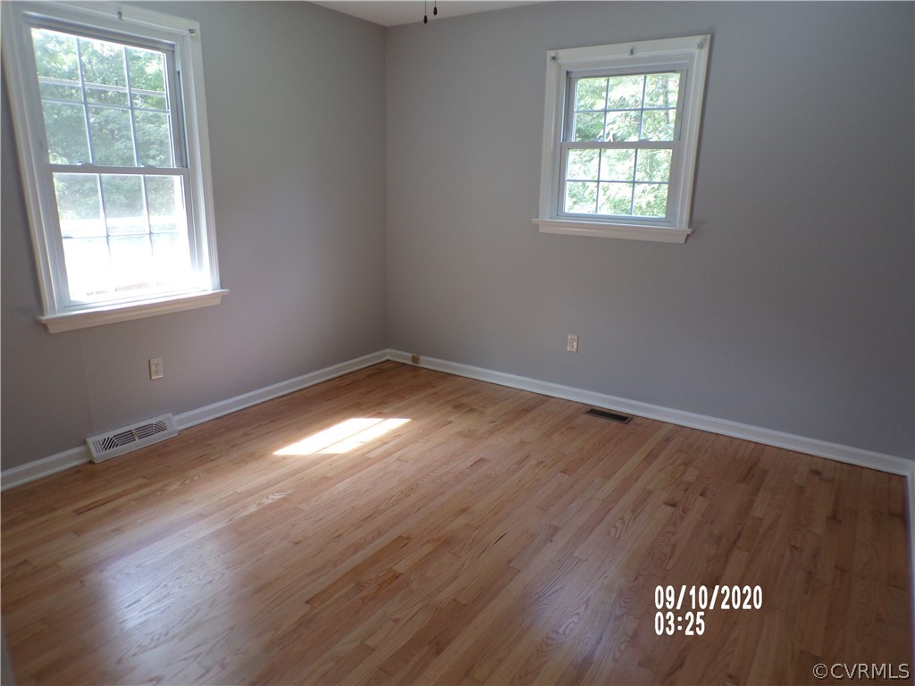 4687 Bell Road Powhatan, VA 23139 - Photo 10 of 13 Bedroom one - ceiling fan with light