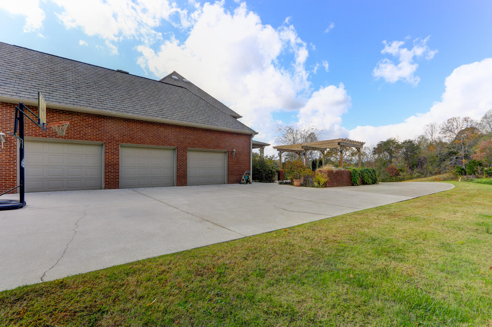 775 Randles Road Strawberry Plains, TN 37871 - Photo 3 of 38 3 car extra wide garage space