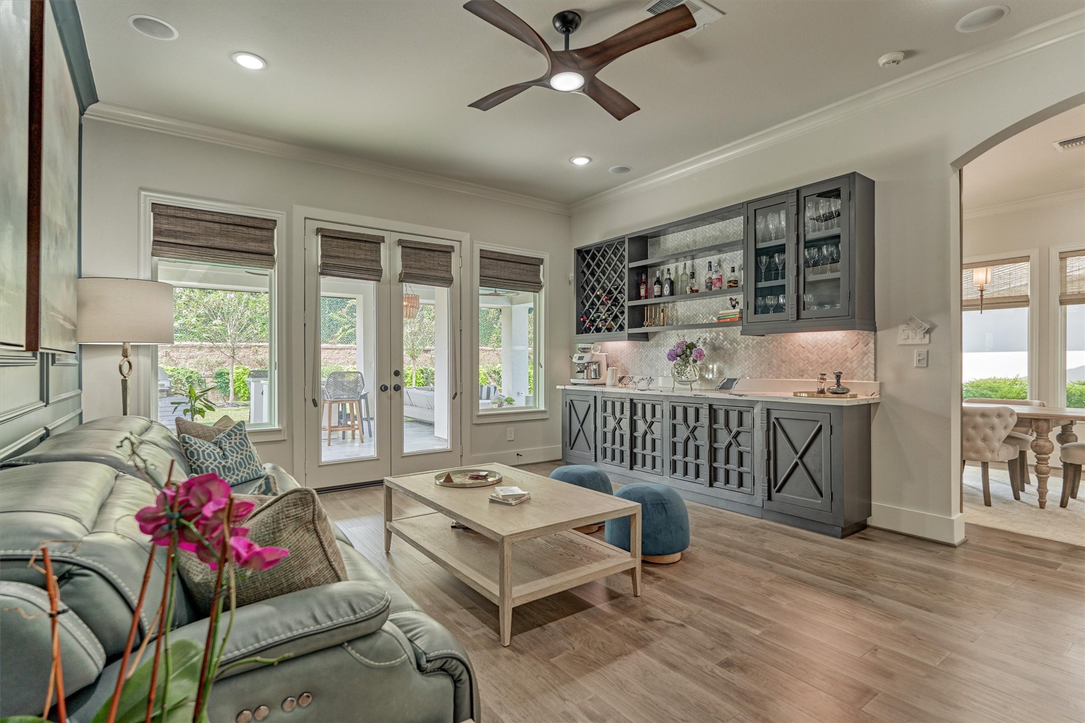 2017 Bennet Lane Conroe, TX 77384 - Photo 16 of 50 a living room with furniture and a floor to ceiling window
