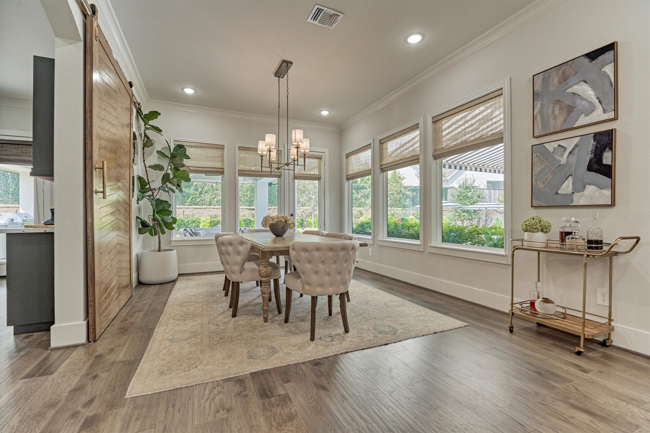 2017 Bennet Lane Conroe, TX 77384 - Photo 17 of 50 a view of a dining room with furniture window and wooden floor