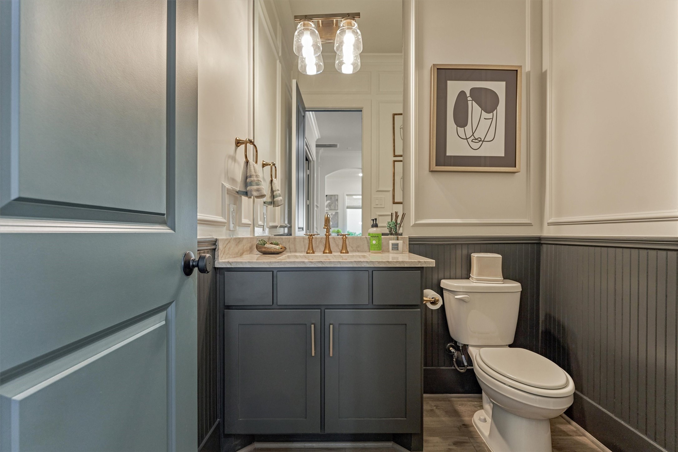 2017 Bennet Lane Conroe, TX 77384 - Photo 21 of 50 a bathroom with a toilet sink and mirror