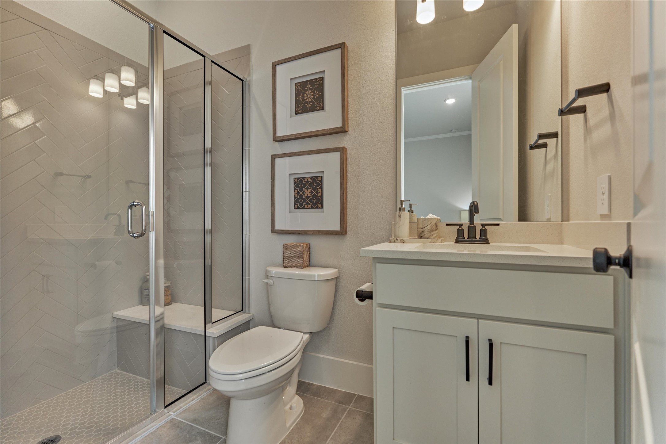 2017 Bennet Lane Conroe, TX 77384 - Photo 25 of 50 a bathroom with a sink toilet and shower