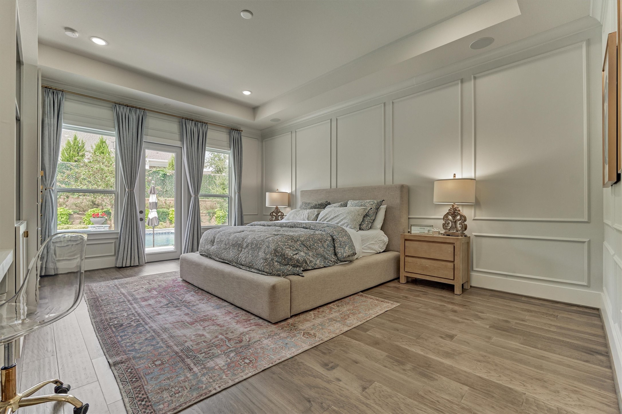 2017 Bennet Lane Conroe, TX 77384 - Photo 26 of 50 a bedroom with a large bed and a large window