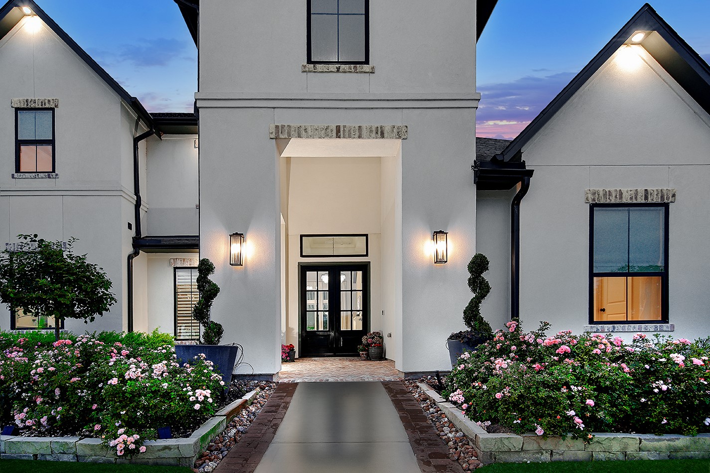 2017 Bennet Lane Conroe, TX 77384 - Photo 3 of 50 a front view of a house with a garden