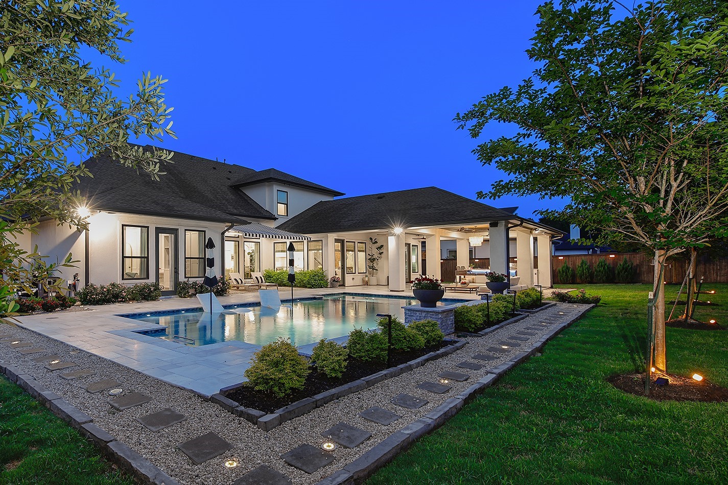 2017 Bennet Lane Conroe, TX 77384 - Photo 4 of 50 a view of a house with swimming pool and a yard