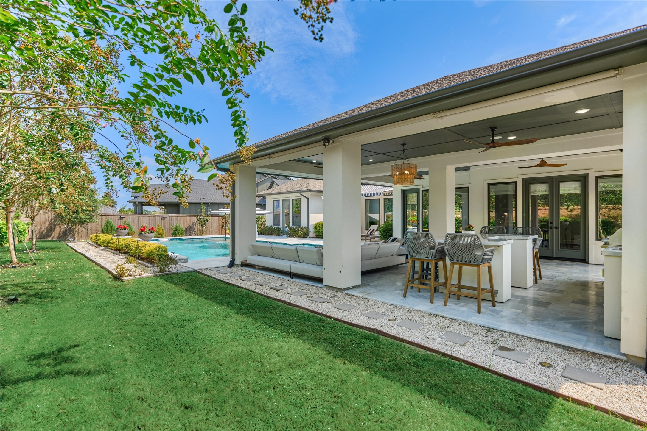 2017 Bennet Lane Conroe, TX 77384 - Photo 44 of 50 a view of a house with backyard porch and sitting area