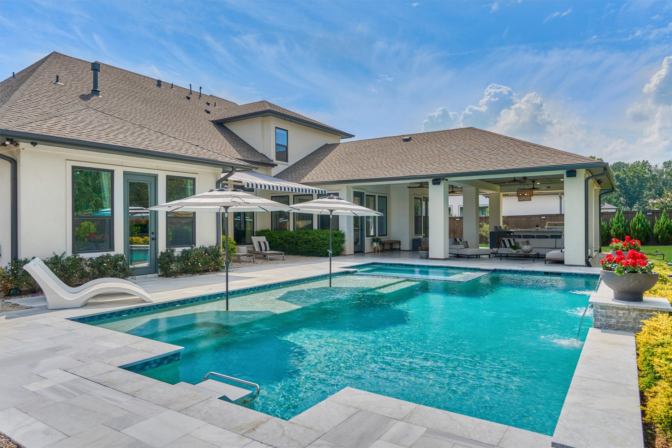 2017 Bennet Lane Conroe, TX 77384 - Photo 46 of 50 a view of a house with backyard sitting area and porch