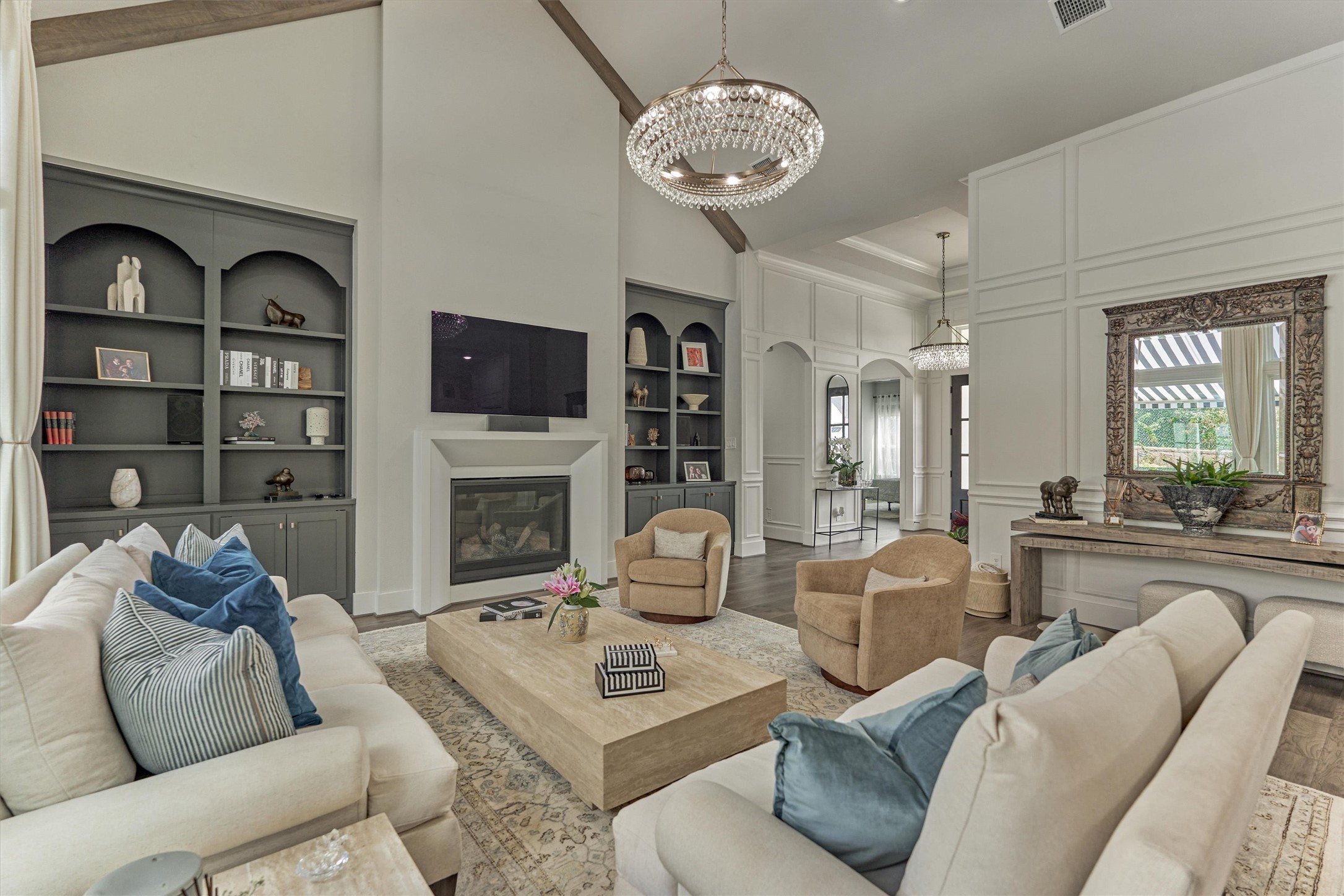 2017 Bennet Lane Conroe, TX 77384 - Photo 8 of 50 a living room with furniture a fireplace and a flat screen tv