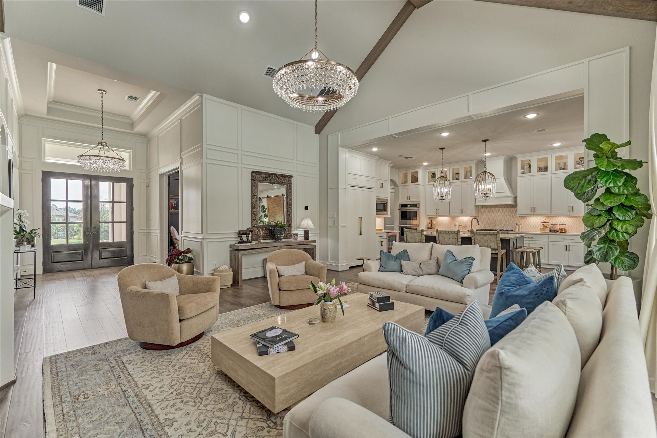 2017 Bennet Lane Conroe, TX 77384 - Photo 10 of 50 a living room with furniture a chandelier and a chandelier