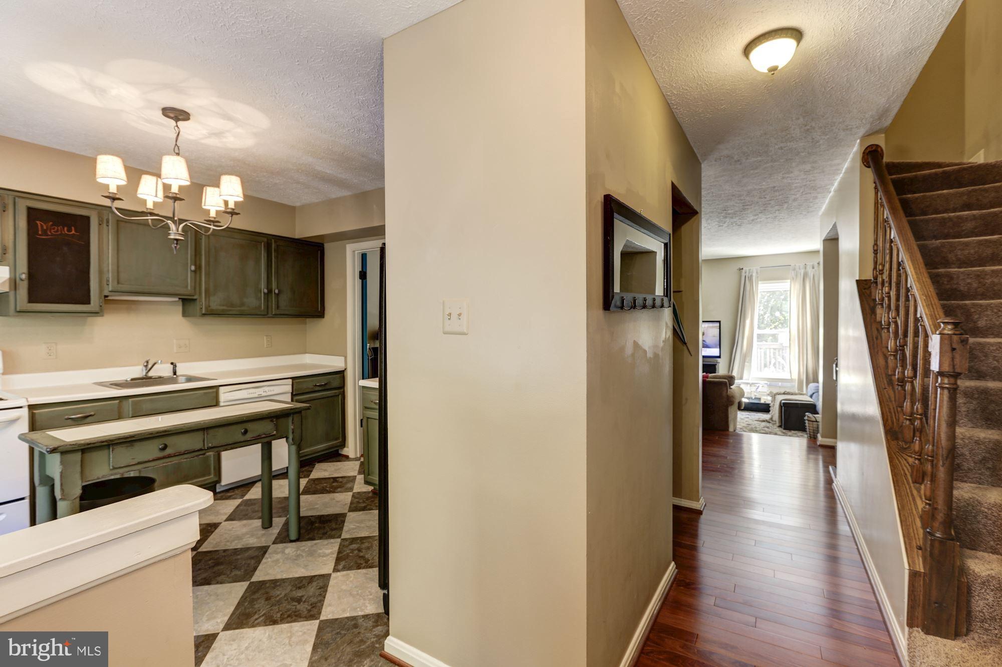7365 Stream Way Springfield, VA 22152 - Photo 3 of 42 Hardwood floors greet you