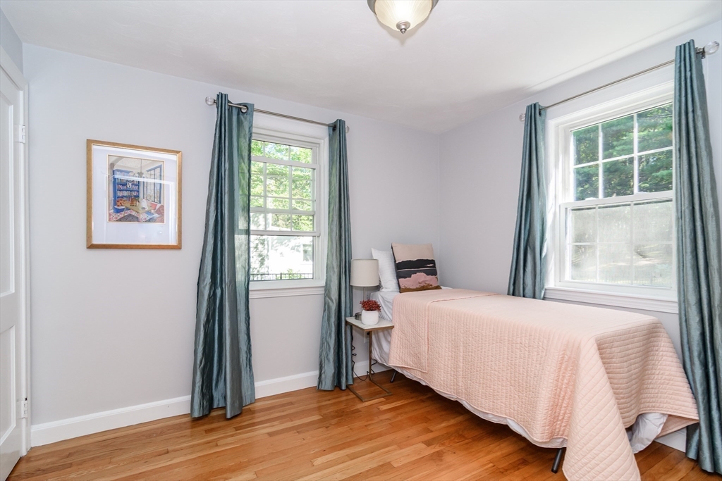 4 Pryor Road Natick, MA 01760 - Photo 12 of 24 a bedroom with a bed and a window