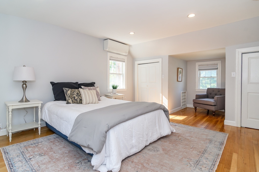 4 Pryor Road Natick, MA 01760 - Photo 13 of 24 a bedroom with a bed and window