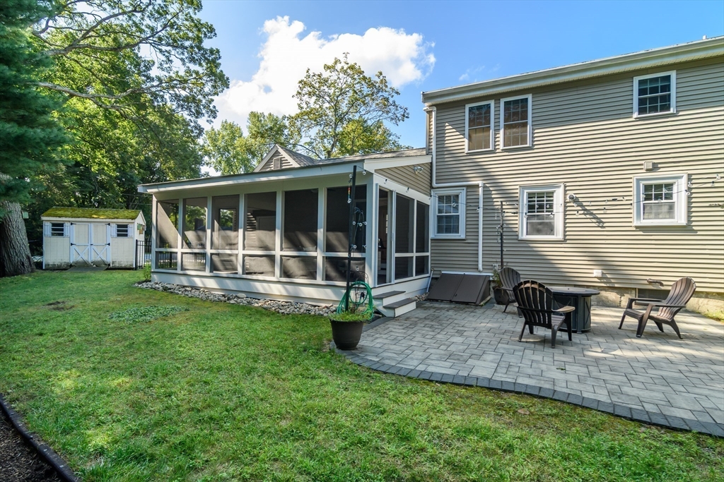 4 Pryor Road Natick, MA 01760 - Photo 24 of 24 a view of a house with backyard sitting area and garden