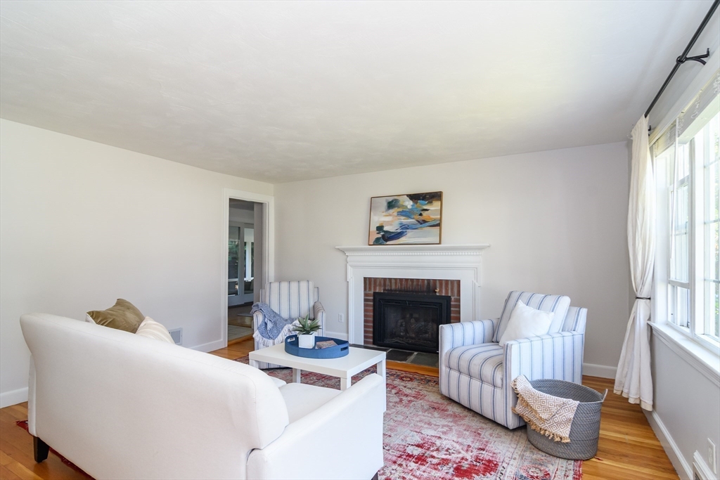 4 Pryor Road Natick, MA 01760 - Photo 4 of 24 a living room with furniture and a fireplace