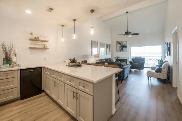 a kitchen with a sink and cabinets