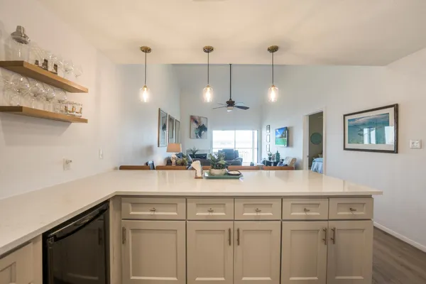 a kitchen with a sink and cabinets