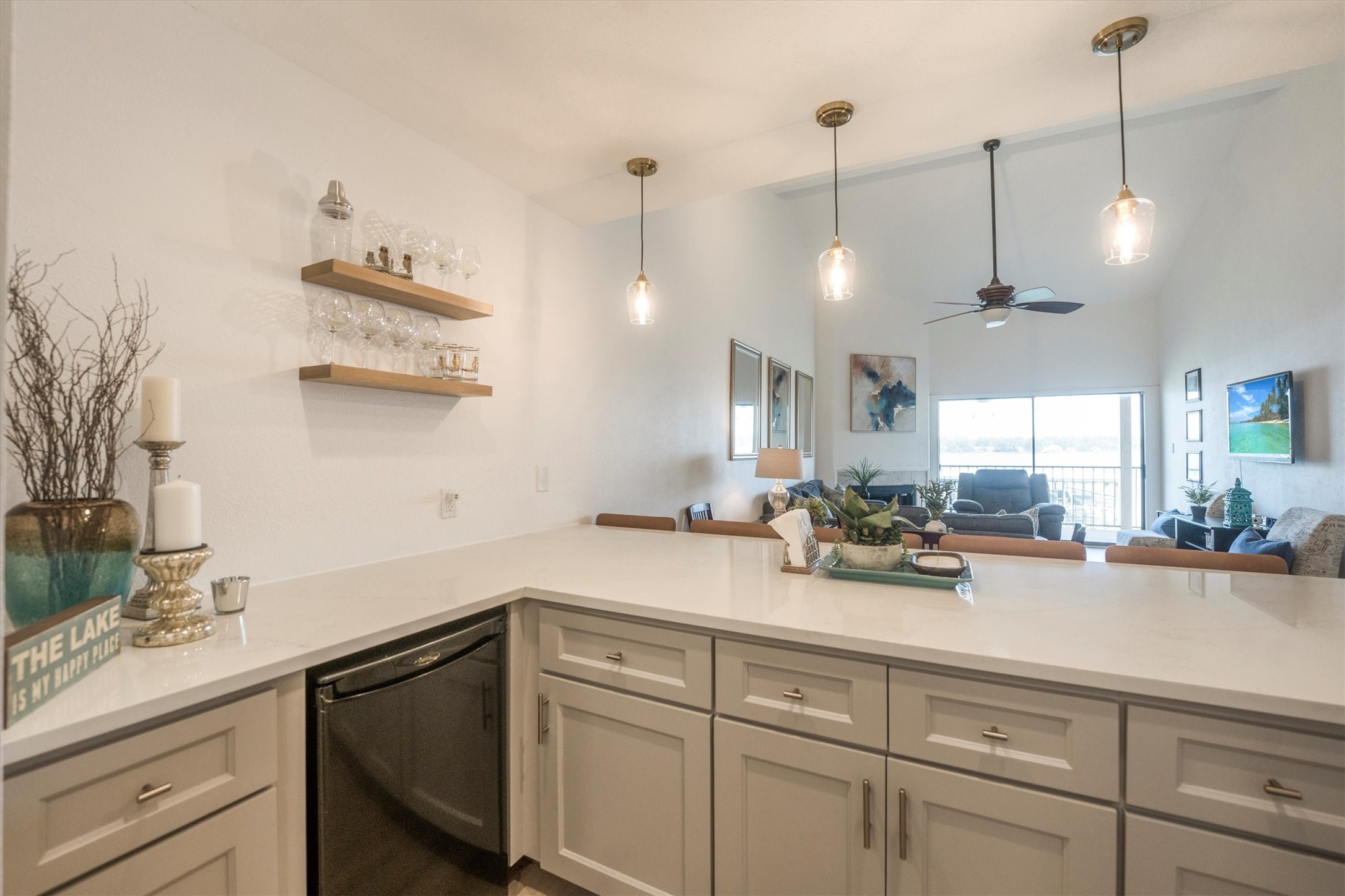 202 Lakeview Terrace, Unit A Conroe, TX 77356 - Photo 13 of 45 a kitchen with a sink and cabinets
