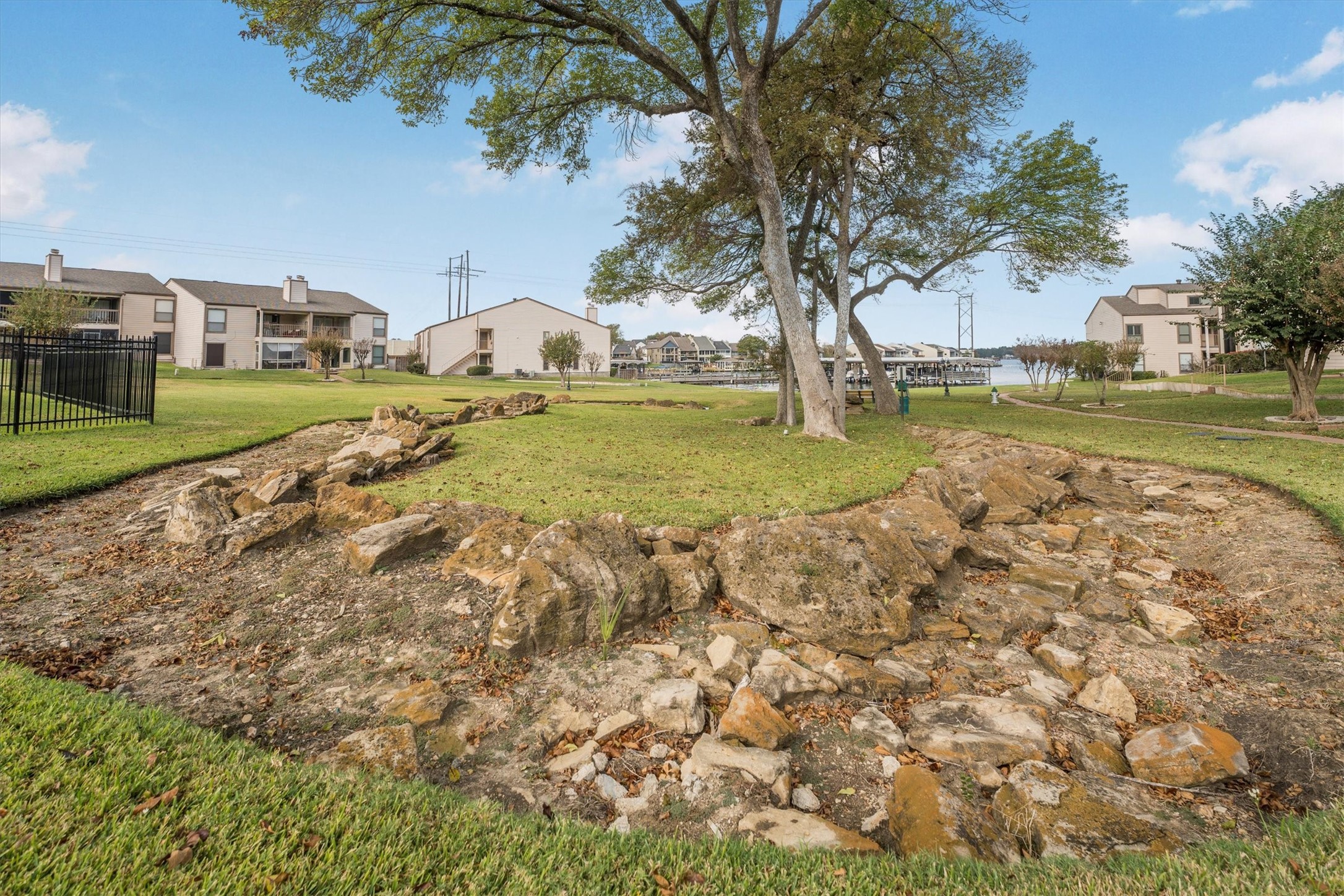 202 Lakeview Terrace, Unit A Conroe, TX 77356 - Photo 45 of 45 a view of an outdoor space and swimming pool