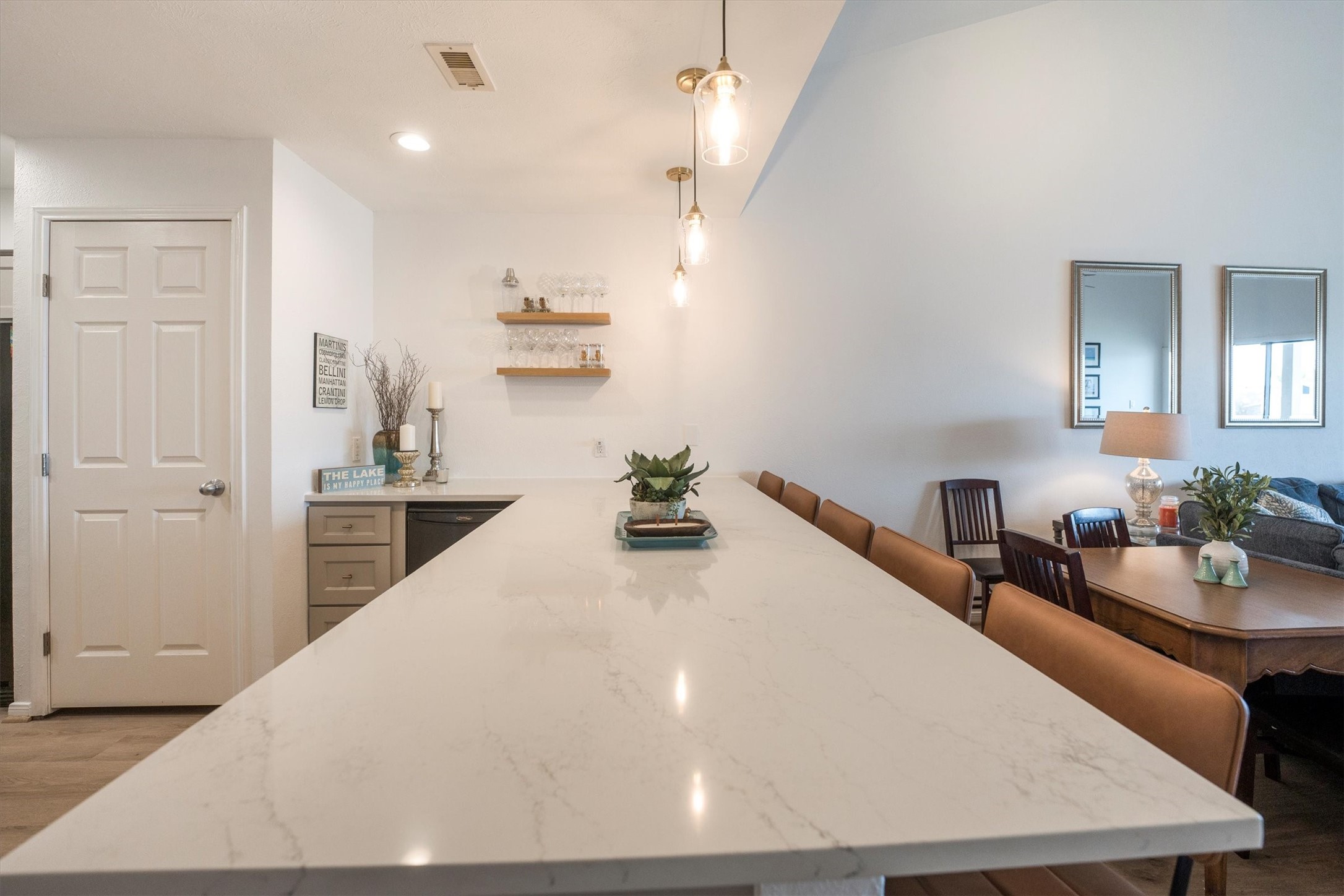 202 Lakeview Terrace, Unit A Conroe, TX 77356 - Photo 8 of 45 a kitchen with kitchen island a sink stainless steel appliances and cabinets