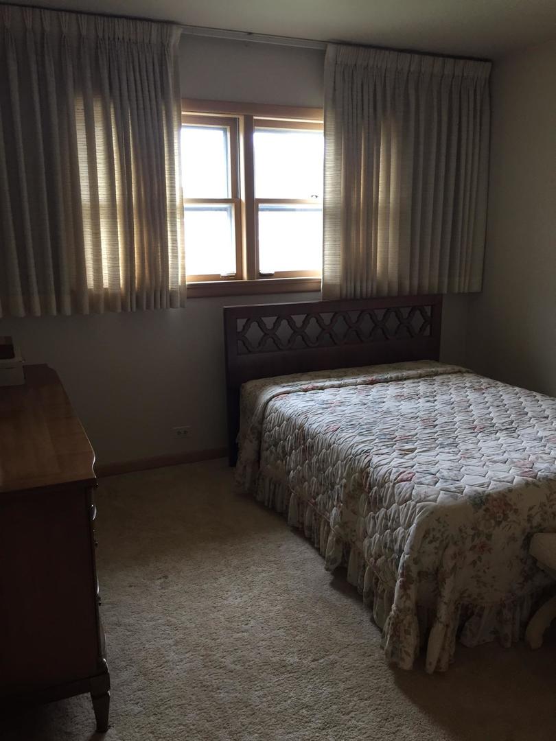 4500 Plainfield Avenue Norridge, IL 60706 - Photo 13 of 29 a bedroom with a bed and with windows