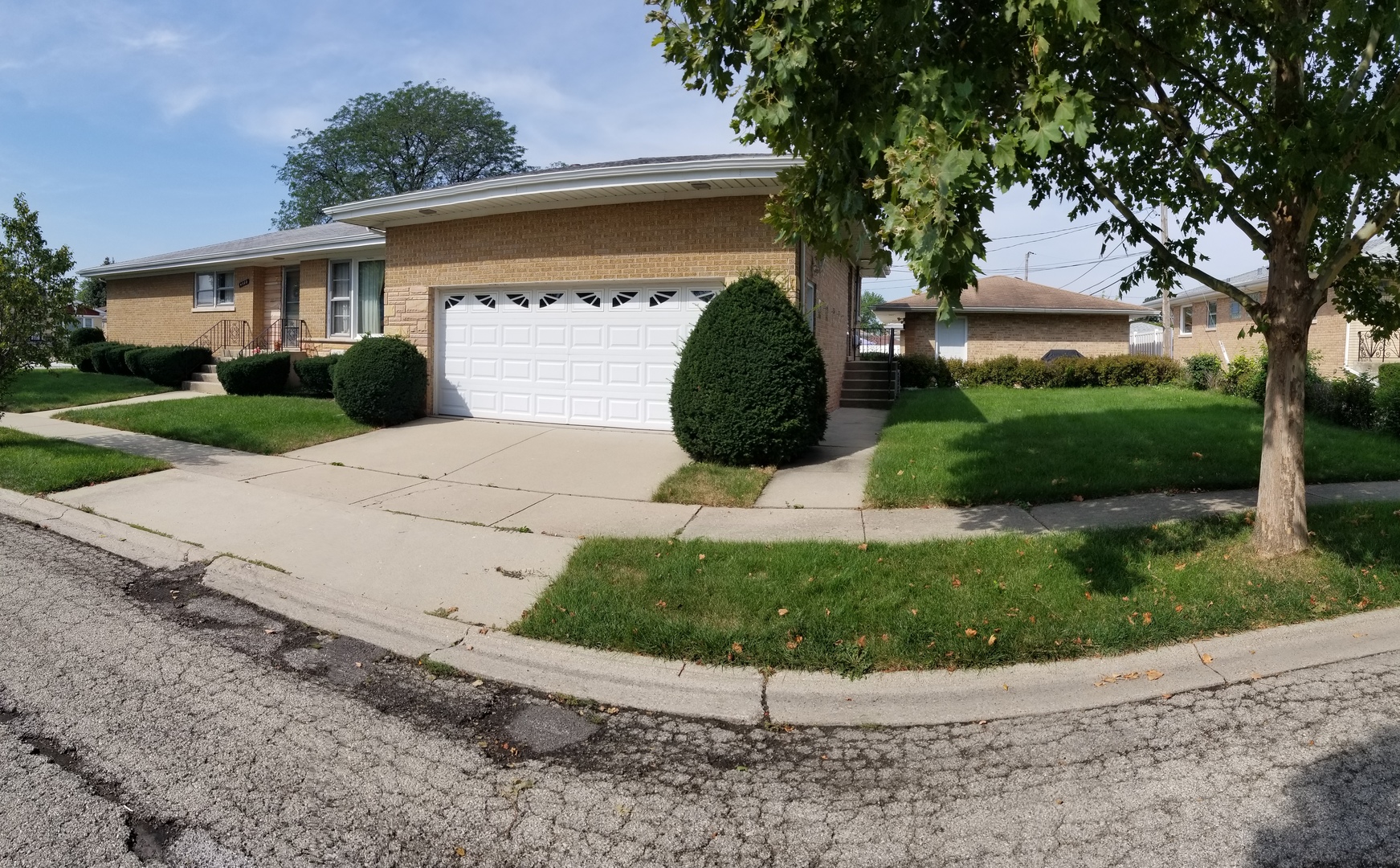 4500 Plainfield Avenue Norridge, IL 60706 - Photo 29 of 29 a view of a white house with a yard and large tree
