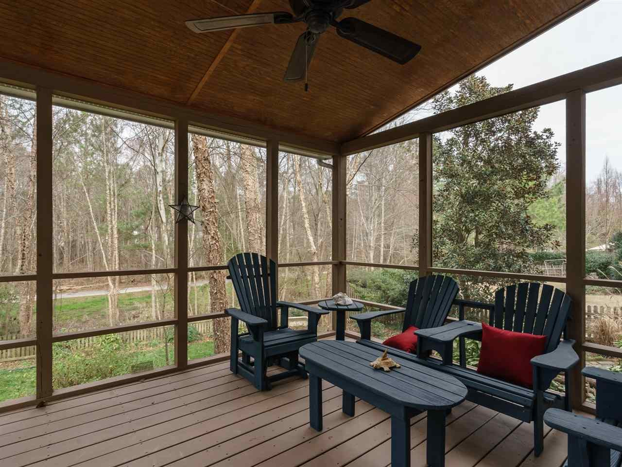 1105 Patterson Grove Road Apex, NC 27502 - Photo 20 of 25 Entertaining can easily flow to the outdoor space at this lovely home. Enjoy relaxing on the screen porch with a good book. Screen Porch