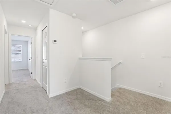 an empty room with an entryway