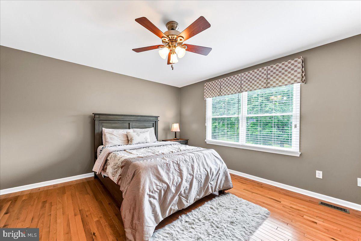 408 Brentford Road Kennett Square, PA 19348 - Photo 27 of 41 a bedroom with a bed and window