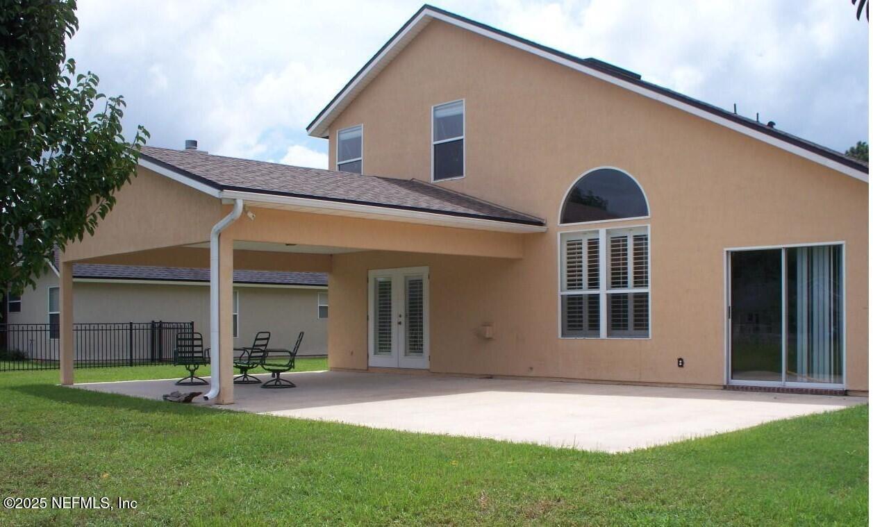 1288 Loch Tanna Loop St. Johns, FL 32259 - Photo 24 of 25 front view of a house with a yard