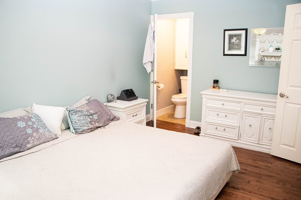85-87 Slater Street Webster, MA 01570 - Photo 34 of 41 a bedroom with a bed and a window