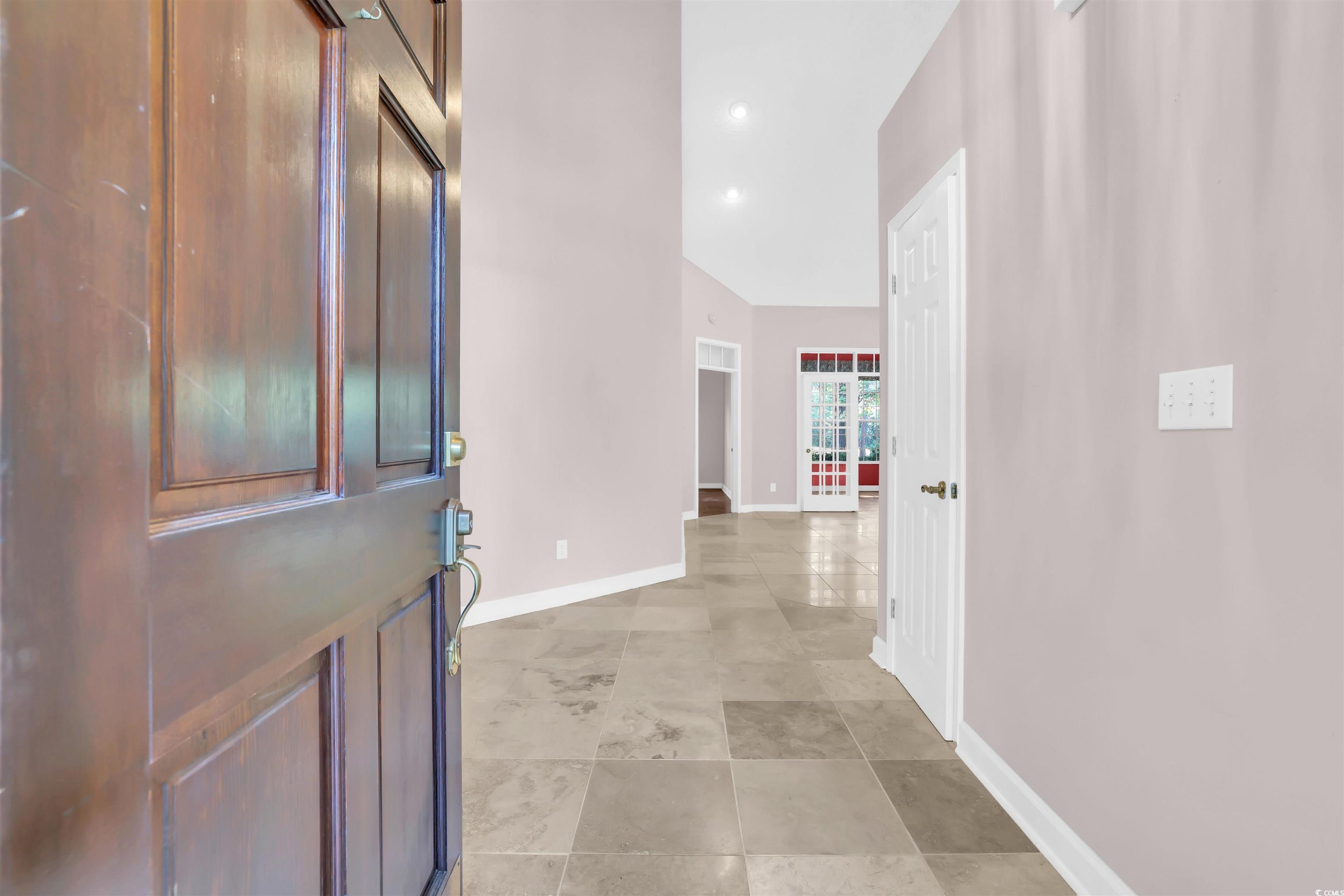 9350 Pinckney Lane Murrells Inlet, SC 29576 - Photo 21 of 40 Foyer featuring recessed lighting and light tile patterned floors