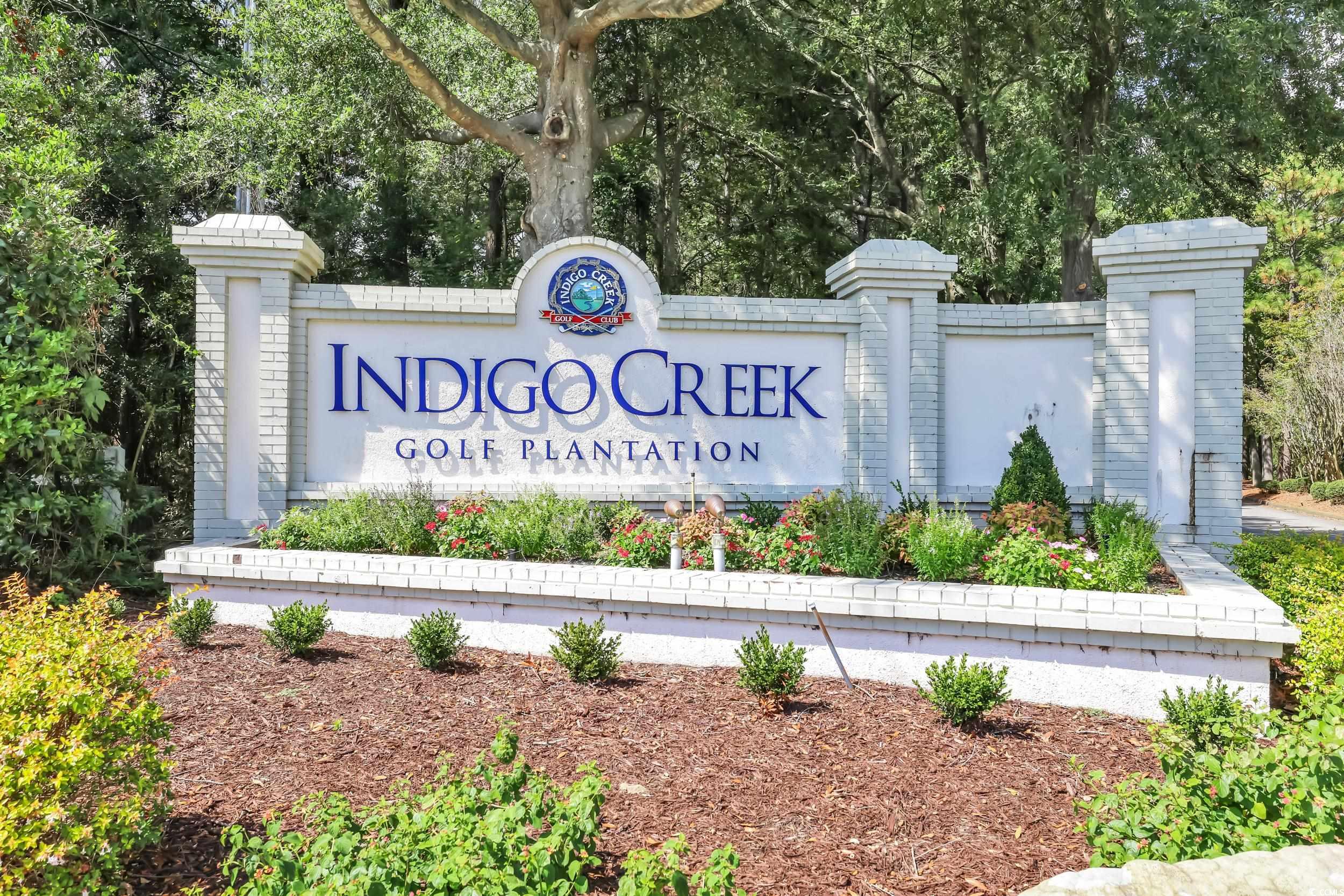 9350 Pinckney Lane Murrells Inlet, SC 29576 - Photo 3 of 40 Community / neighborhood sign with view of scattered trees